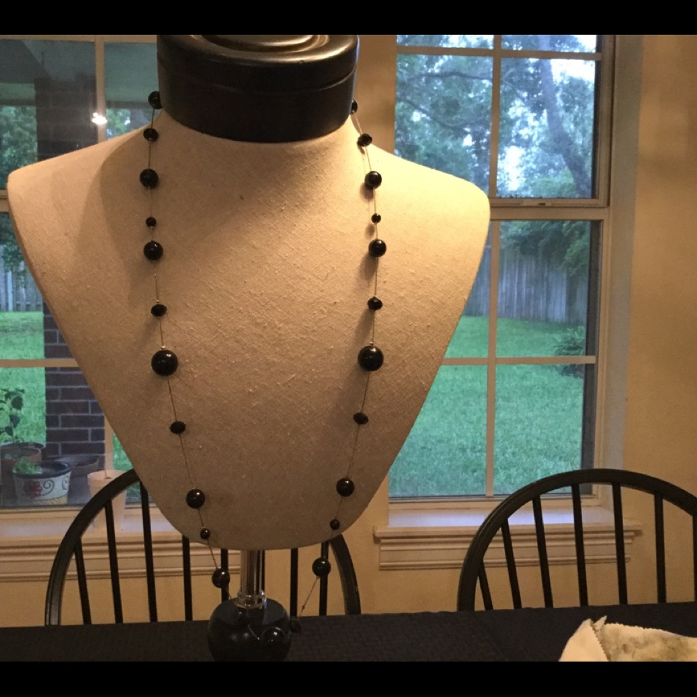 Black bead and silver tone necklace and earrings